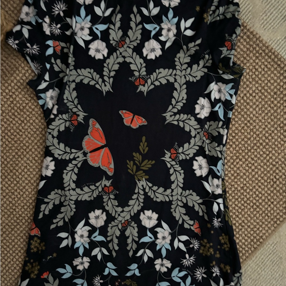 Ted baker t shirt.  Navy background.  Pattern